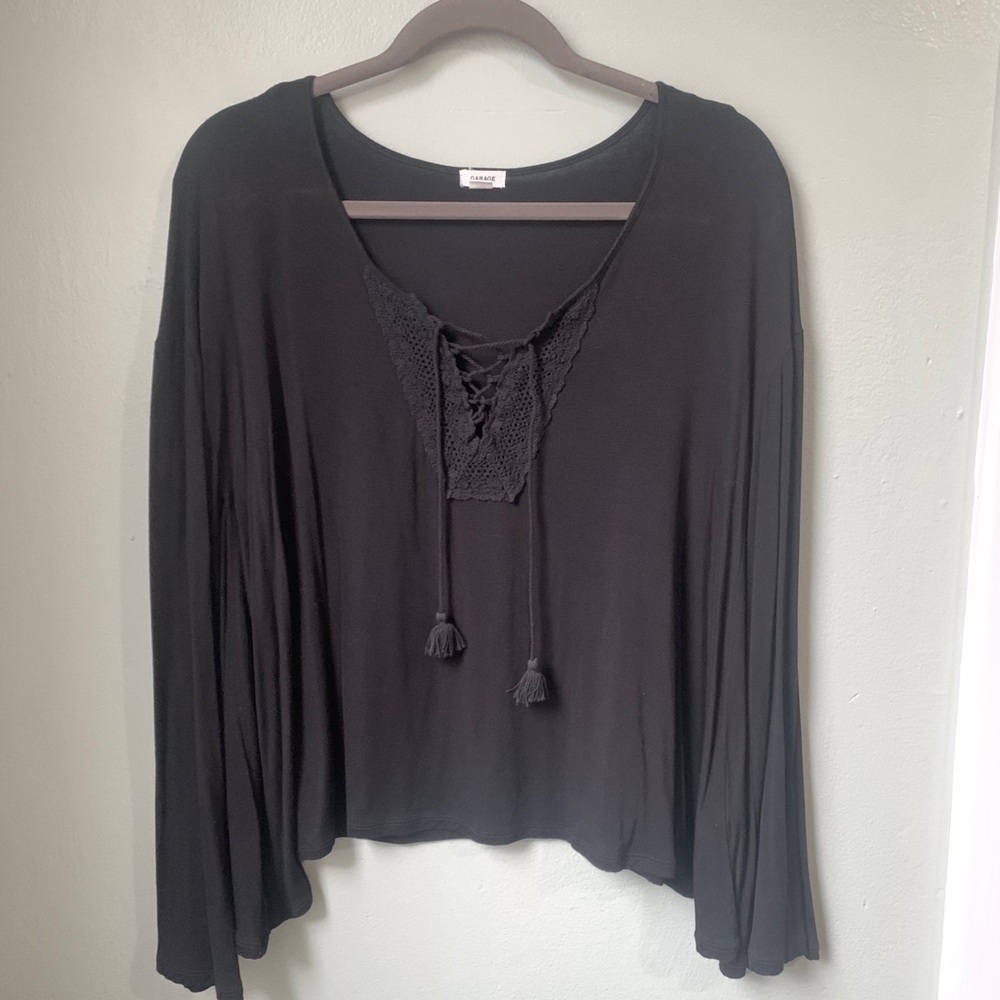 Long Sleeve Flow Top Size Medium “Garage” brand